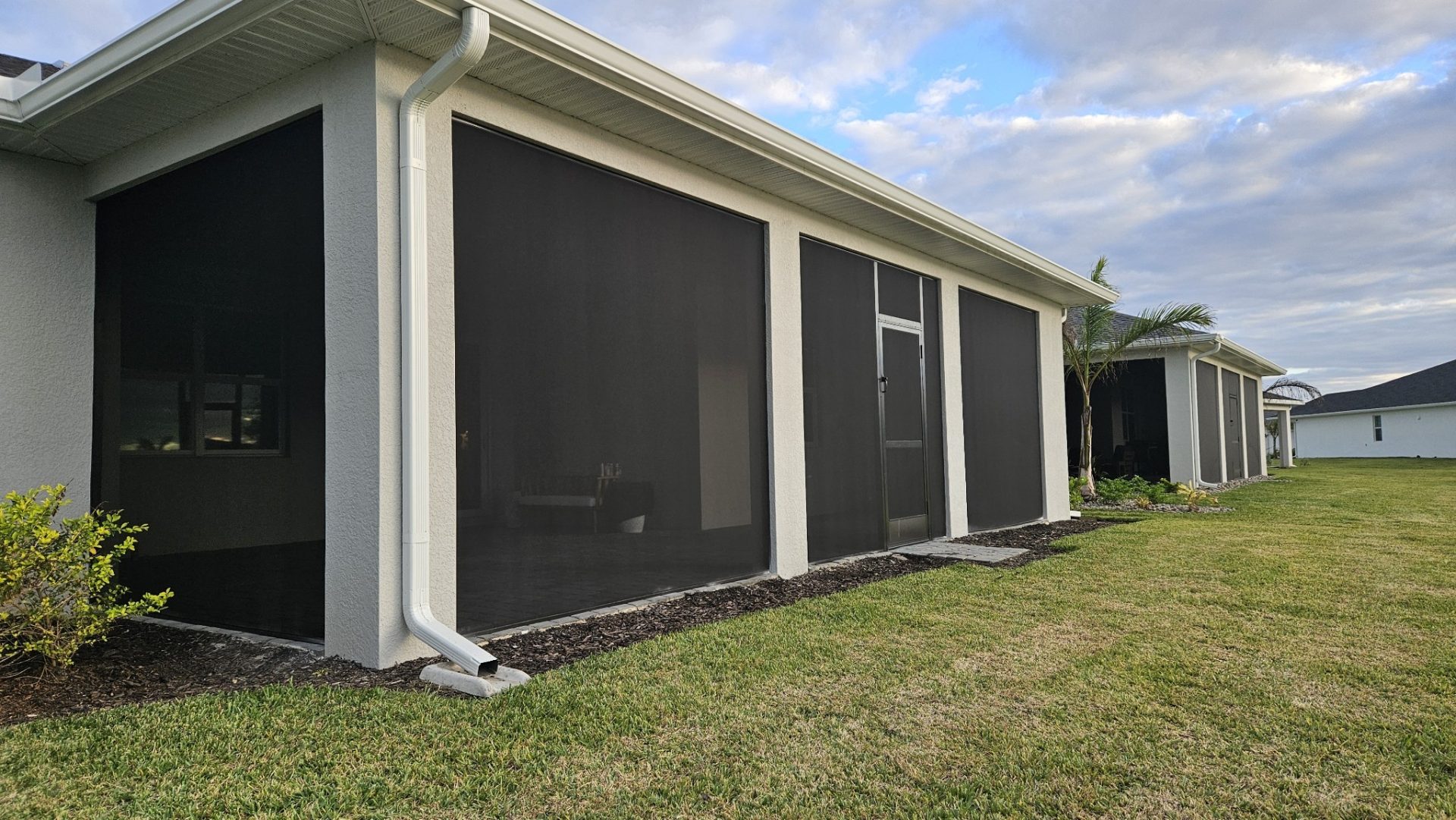 Screened patio area ideal for lanai rescreening services.